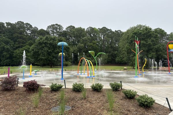 Kids cooling off at White Deer Park Splash Pad in Garner